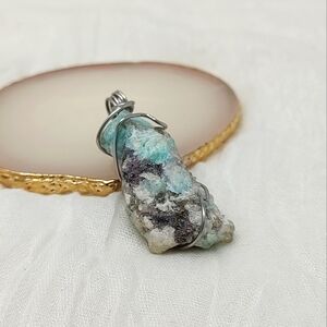 Turquoise color stone wire wrapped pendant